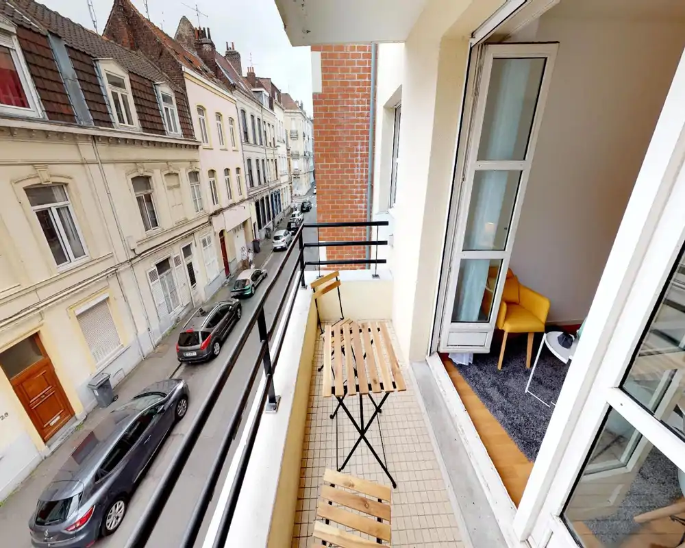 The image is too heavily corrupted and pixelated to reliably identify the room type or meaningful interior details.