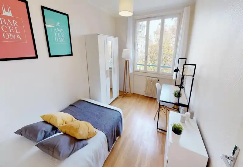 Bright, stylish single bedroom with a comfortable bed, wardrobe with mirrored door, study desk and large window providing plenty of natural light.