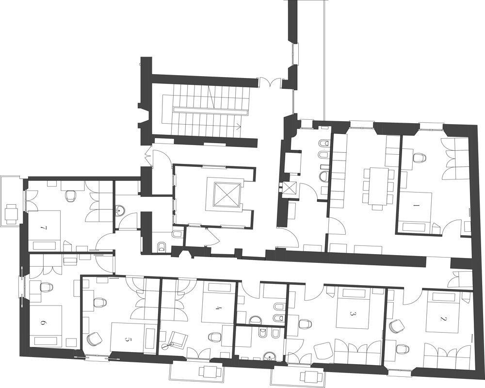 Detailed floor plan (planimetry) showing layout of multiple rooms, corridors, bathrooms and stairwell — suitable as an apartment or building floor drawing for listings and documentation.