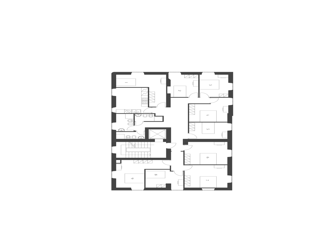 Architectural floor plan image showing the layout of multiple rooms and circulation (plan view). Clean black background highlights a centralized grayscale plan drawing.
