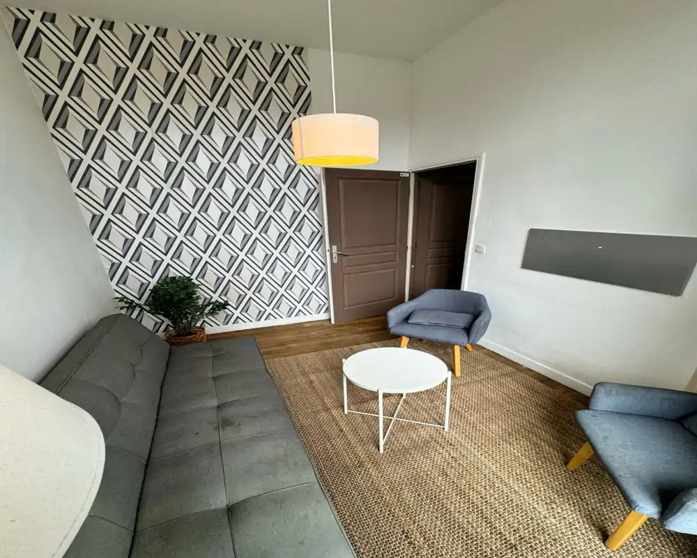 Unable to classify reliably: the image is heavily corrupted with digital artifacts that obscure furniture and layout, preventing a clear identification of the room.