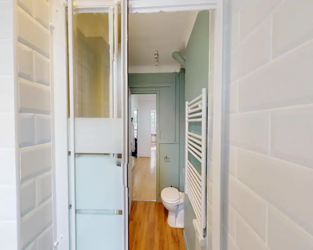 Image is too corrupted to determine the room type. The photo contains heavy digital distortion and artifacts that obscure furniture and architectural details.