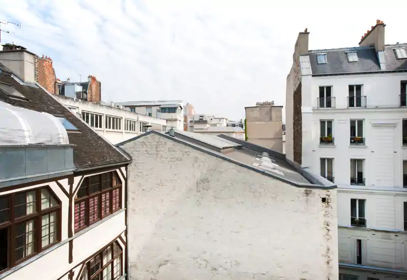 Image is heavily corrupted by digital artifacts and cannot be reliably classified as an interior room or outdoor area.