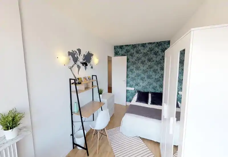 Impossible de fournir une description fiable de la pièce : l'image est fortement corrompue et déformée, empêchant l'identification sûre des éléments de la pièce.