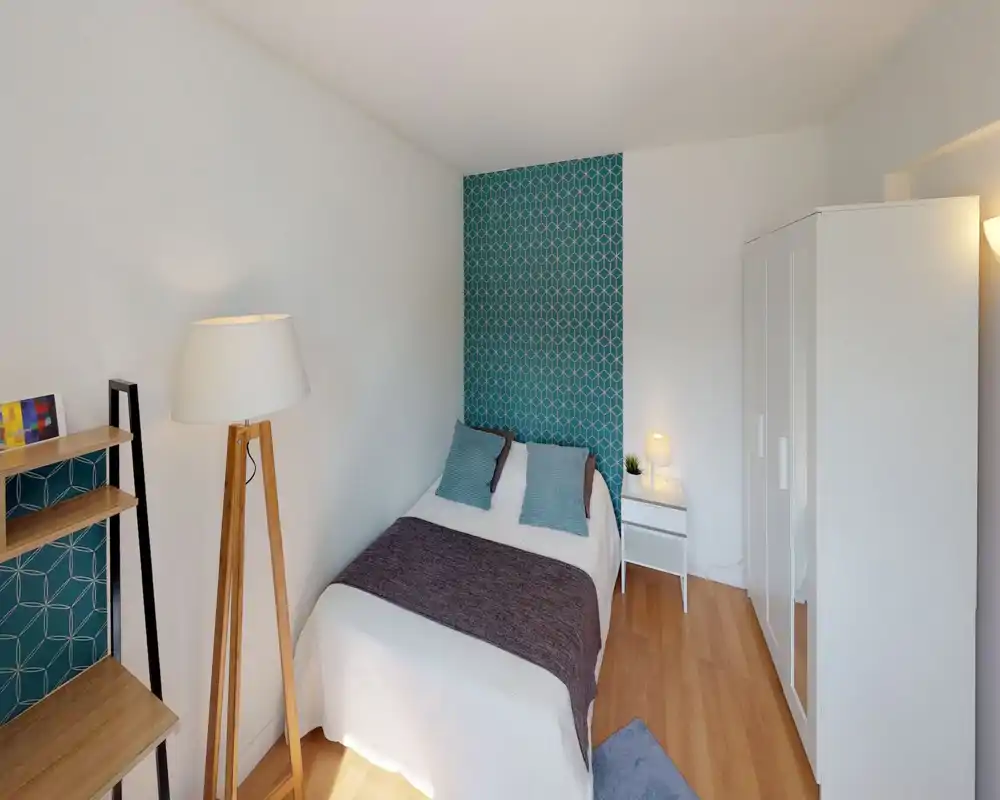 Unable to classify: the image is heavily corrupted and pixelated, obscuring furniture and room features needed to identify the room type.