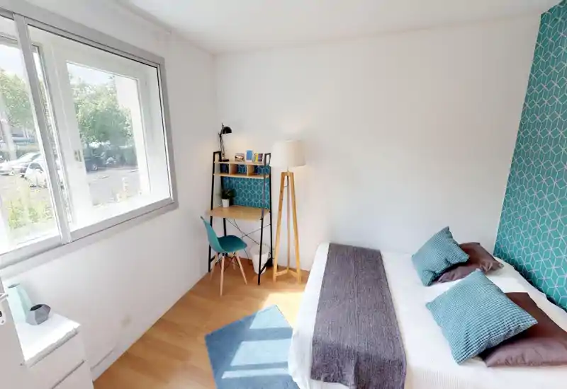 Unable to produce a reliable room description: the image is heavily corrupted and visual details (furniture, bed, windows) are obscured by digital artifacts.