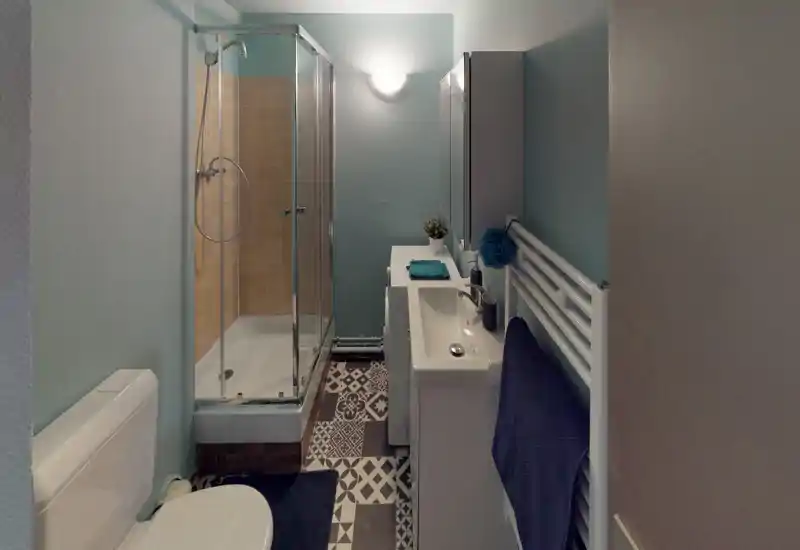 Image corrupted: heavy digital artefacts prevent reliable identification of the room. Please provide a clearer photo showing furniture or architectural features.