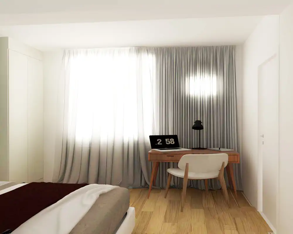 Chambre lumineuse et minimaliste avec lit au premier plan et petit bureau en bois près d'une grande fenêtre avec rideaux. Lignes épurées, lumière naturelle et textiles simples offrent un espace calme et fonctionnel.