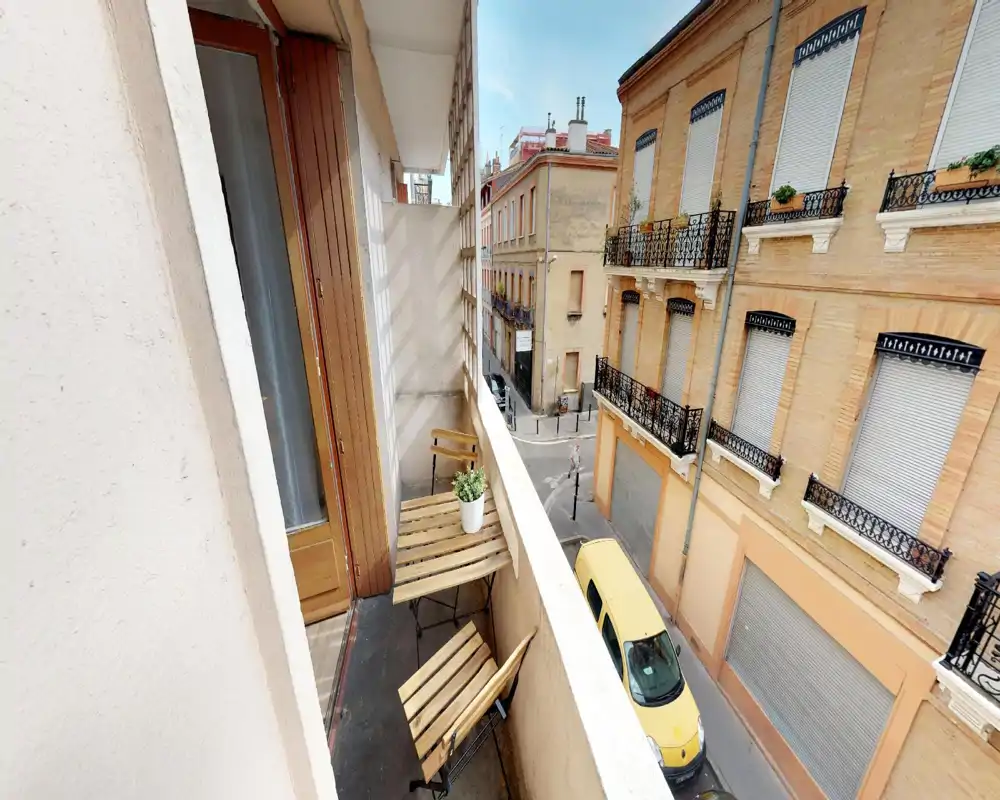 Image corrupted by digital artifacts; the room content is not reliably identifiable.